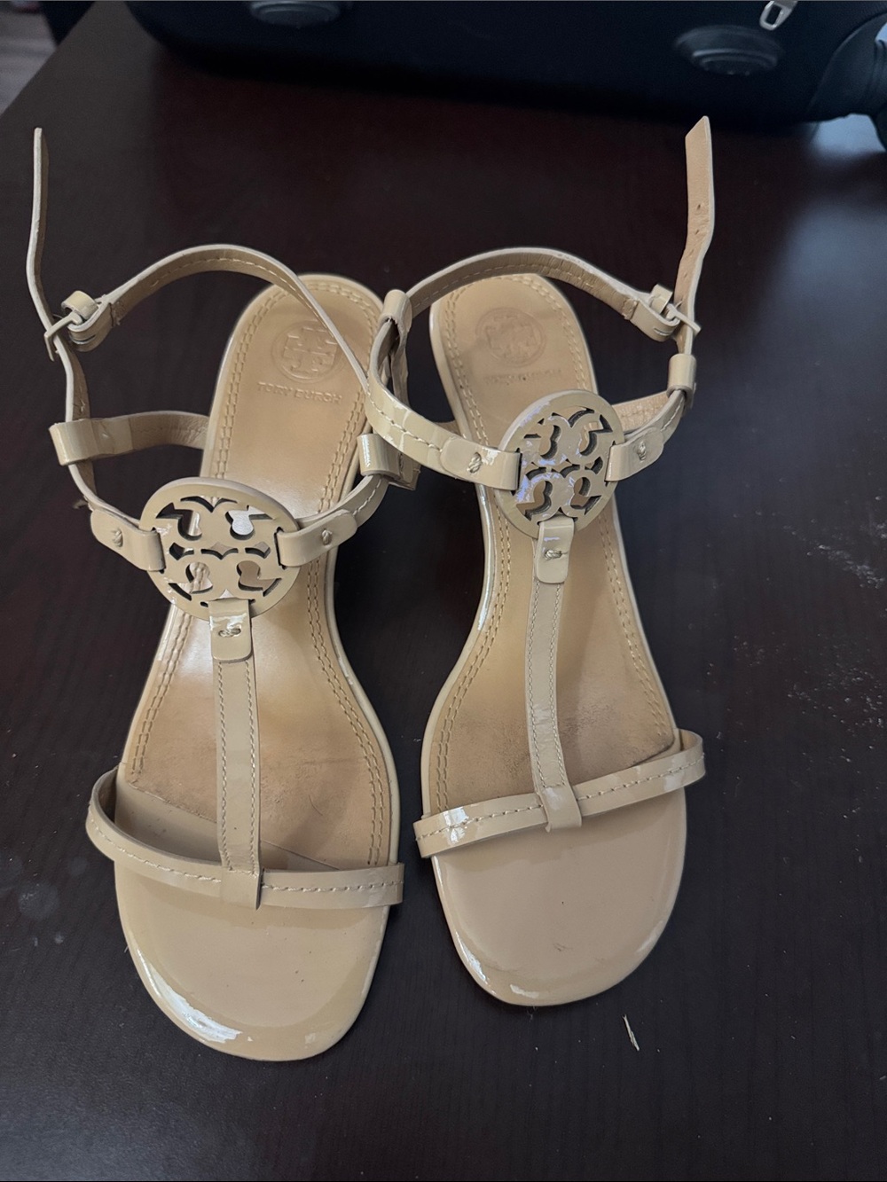 Tory Burch Nude Patent T-Strap Sandals with Logo Medallion